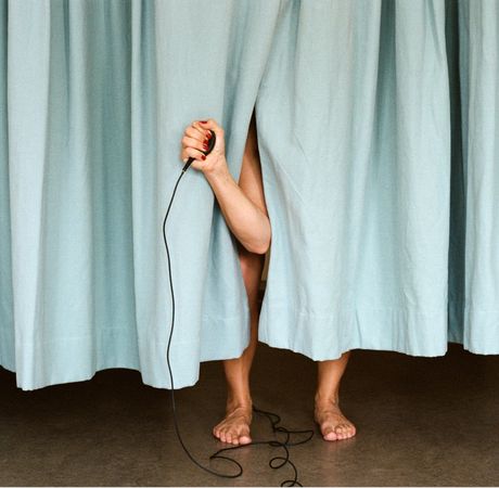 _Martina_Stapf_self_in_curtain_2021_52x76cm_Pigment_Print_auf_Aludibond.jpg